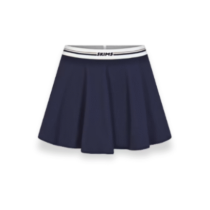 SKIMS navy tennis skirt featuring a sleek design and comfortable fit, perfect for active wear or casual outings.